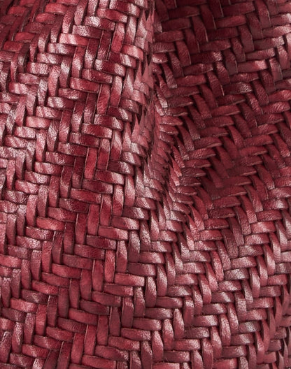 pompom-double-jump-bordeaux-woven-leather-bucket-bag_fabric.jpeg