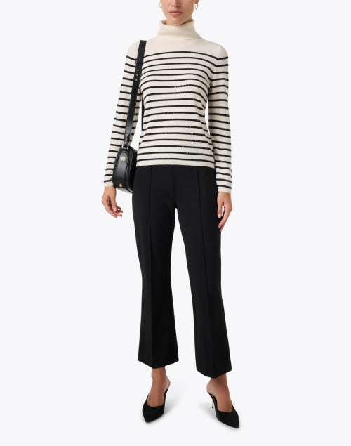 Cream and black striped sweater hotsell