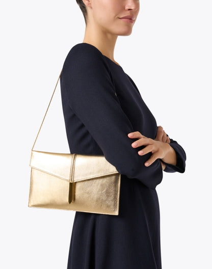 tokyo-gold-leather-clutch_look.jpeg