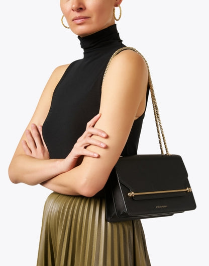 east-west-black-leather-crossbody-bag_look.jpeg