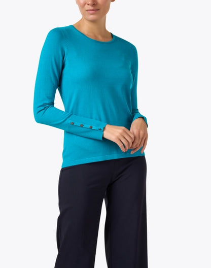 peacock-blue-knit-button-cuff-top_front.jpeg