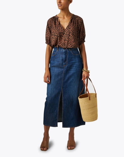 gelada-dark-wash-denim-midi-skirt_look.jpeg