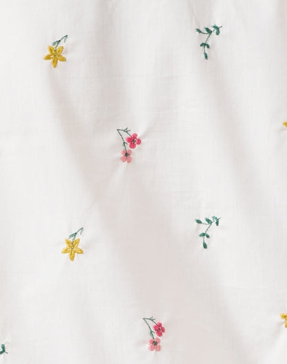 villar-white-floral-cotton-blouse_fabric.jpeg