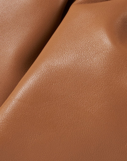 willa-dark-sand-leather-cinched-clutch_fabric.jpeg