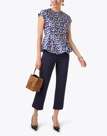 fayence-multi-print-peplum-top_look.jpeg