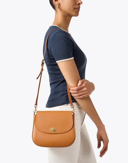 turnlock-louis-tan-crossbody-bag_look.jpeg