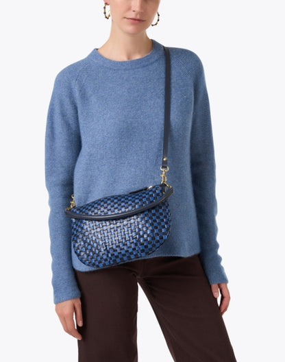 petit-moyen-blue-leather-messenger-bag_look.jpeg