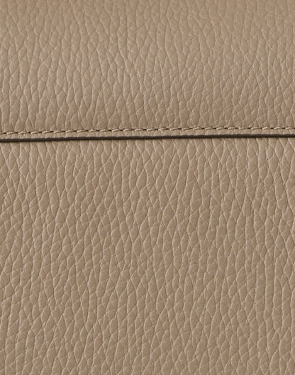 taupe-leather-crossbody-bag_fabric.jpeg