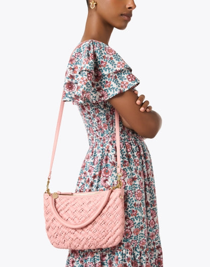 petit-moyen-pink-leather-woven-messenger-bag_look.jpeg