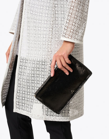 clic-clac-black-lam-leather-clutch_look.jpeg