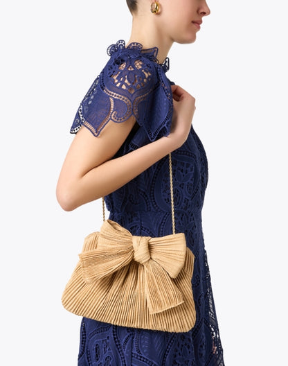 rayne-pleated-straw-bow-clutch_look.jpeg