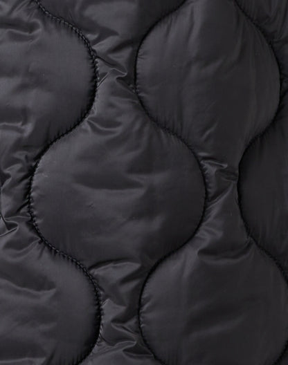 black-quilted-puffer-coat_fabric.jpeg