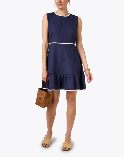 sleeveless-ruffle-hem-navy-dress-with-white-stitch-detail_look.jpeg